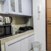 Отель Homey and Comfy 2BR at Vida View Apartment, фото 6