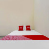 Отель Super OYO 92437 Wahidin Guesthouse, фото 7