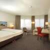 Отель H+ Hotel Darmstadt, фото 5