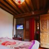 Отель Lijiang Yuese Inn, фото 3