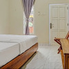 Отель Capital O 93345 The Saka Guest House Syariah, фото 14