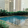 Отель Minimalist and Homey 1BR at Ciputra World 2 Apartment, фото 12