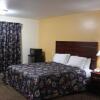 Отель Passport Inn and Suites, фото 15