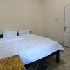 Отель OYO 93207 Merah House, фото 5