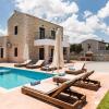 Отель Dimokritos Villas IV, V, & VI, a homestay experience, By ThinkVilla в Ретимноне