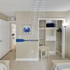 Отель Peaceful Beach Getaway W/ 3 Pools & Tennis 2 Bedroom Condo, фото 6