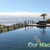 Отель Fabulous Villa, Heated Pool, Games Room, Overlooking Funchal Villa Luz, фото 1