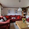 Отель Chalet in Holiday Park With Spacious Living Room, Large Enclosed Garden and Unobstructed View, фото 5