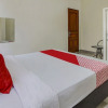 Отель OYO 91084 Oke Guest House, фото 6