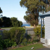 Отель Snug Beach Cabin And Caravan Park, фото 19