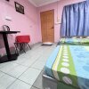 Отель OYO Home 90415 Seri Desa Homestay, фото 9