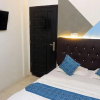 Отель OYO 91026 Kasmarani Residence Syariah, фото 5