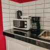 Отель Elegant 1-bedroom Apartment 3 km From Eagle Beach, фото 9