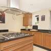 Отель Wimbledon 2 Bedroom Apartment в Лондоне