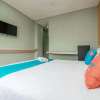 Отель Sans Hotel Fiducia Pondok Gede, фото 11