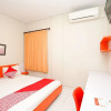 Отель OYO flagship 748 Comfitel Tenggilis, фото 18