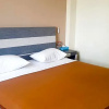 Отель OYO 91266 Markoni 18 Guest House, фото 15