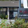 Отель Rose Garden Inn, фото 1
