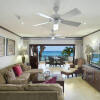 Отель Coral Cove Beachfront Villas в Пэйнс-Бэй