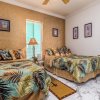 Отель West Beach - Stay On The Sand! Gulf Views Galore, Only Steps To The Shore! 4 Bedroom Home by RedAwni, фото 16