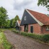 Отель Cozy Farmhouse In Enschede with Terrace, фото 8