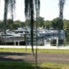 Отель Port of Call Yacht Club at Astor Bridge Marina & Hotel в Асторе