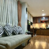 Отель Spacious 1 BR Unit in AppleOne Ayala, фото 2