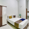 Отель Spot On 91745 Rumah Kost Gresik Syariah, фото 3