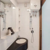 Отель Nice And Comfy Studio Room At Sky House Bsd Apartment, фото 9