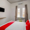 Отель Wisma Bambu Syariah by  OYO Rooms, фото 13
