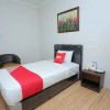 Отель OYO 1864 Tiara Guest House, фото 4