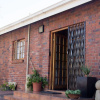 Отель Phokeng Gardens Bed and Breakfast, фото 1