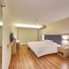 Отель Hanting Hotel Zibo Hengtai Zhangbei Road, фото 16