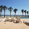 Отель Turquoise Place 1005C ~ Luxurious Beachfront Condo w/ Private Hot Tub!, фото 9