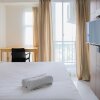 Отель Best Price Studio Apartment at Akasa Pure Living BSD, фото 2