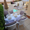 Отель Comfortable apartment in a quiet area, private terrace, shared swimming pool, фото 10