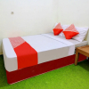 Отель OYO 90725 Zeevanna Guest House Syariah, фото 13