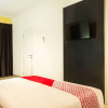 Отель OYO 976 Baloi View Apartment, фото 5