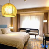 Отель Ramada by Wyndham Zhenjiang City Center, фото 3