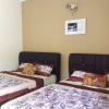 Отель Kapal Terbang Guest House, фото 1