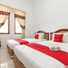 Отель RedDoorz Near Universitas LP3i Medan, фото 8