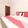 Отель OYO 30274 Temple City Guest House, фото 15