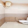 Отель OYO 13314 Grand Almada Inn, фото 7