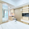 Отель Simply And Homey Designed Studio Room At Taman Melati Jatinangor Apartment, фото 3