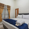 Отель The Lima Guest House Syariah By RedDoorz, фото 10