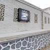 Отель Capital O 92895 House N Caffe 55, фото 1