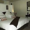 Отель Akidogo Guest House в Пляже Warner Beach