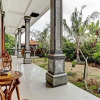 Отель OYO 90458 Pucuk Bali Guest House, фото 13