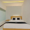 Отель OYO Capital O 90410 Griya Amanah Jajar Syariah, фото 8