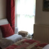 Отель Holly Cottages Guest House, фото 6